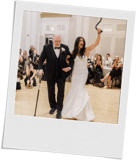 A bride and her father dancing on the dance floor