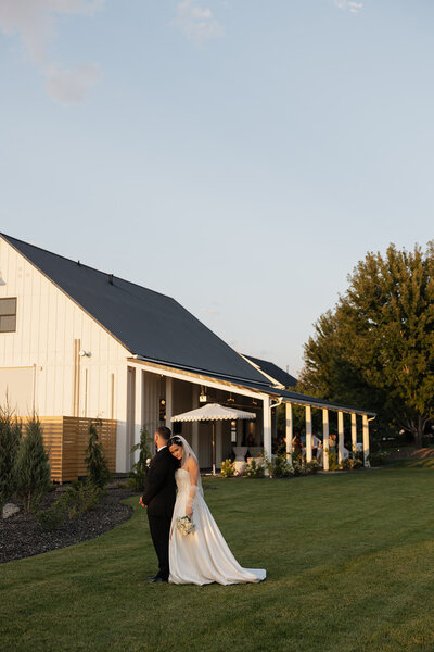 A bride buckles her high heel, getting ready for her wedding.