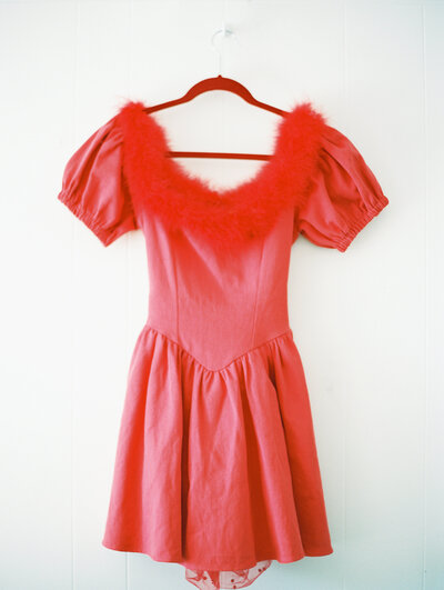 An detail of the bride's vibrant reception dress for a wedding at Dos Pueblos Orchid Farm.