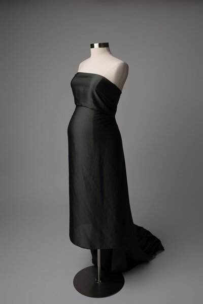 Evergreen two-piece maternity fabric displayed on mannequin