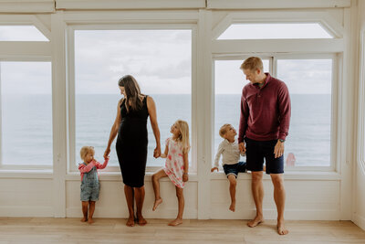 In Home family photo shoot with young kids, beach house, San Diego Family Photographer, candid natural fun family photo shoot with kids, christmas holiday card photo shoot, San Diego portraits photographer, young families