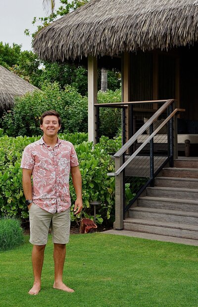 Portrait of Hunter Ainsle from Waimea, Hawaii, luxury developer in front of local project site
