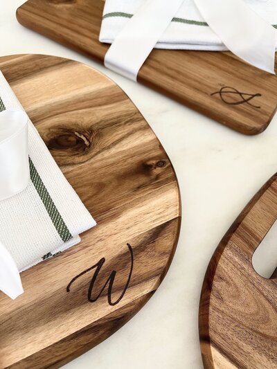 Cutting boards with wood burned calligraphy monogrammed letters