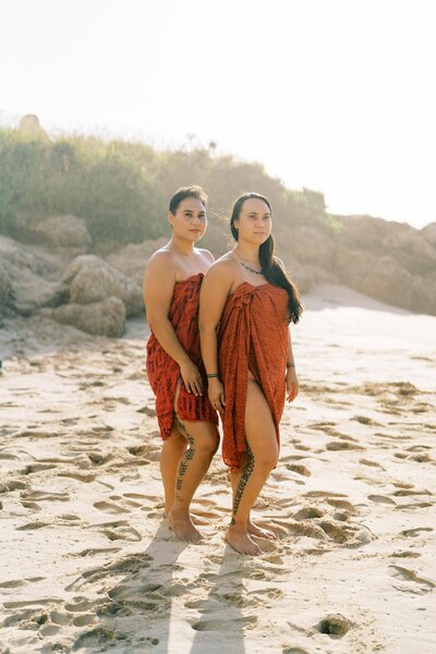 David and Ore's maternity photos at Oahu's Waimanalo Beach. Photography by Megan Moura