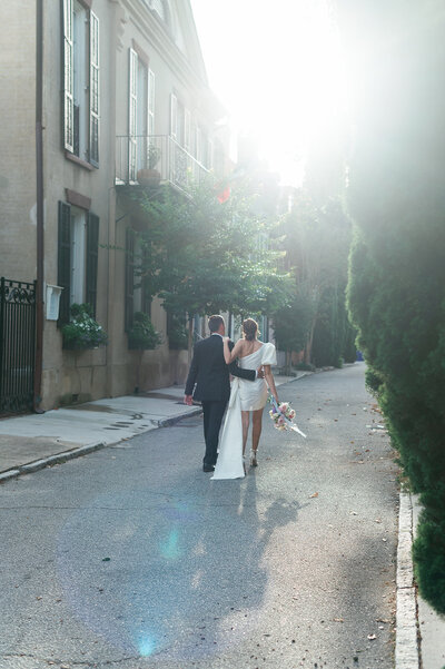 Soft morning light portraits of the couple at Laguna Gloria, with dewy garden paths and serene lakeside views.

