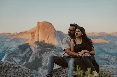 couple at glacier point at sunset