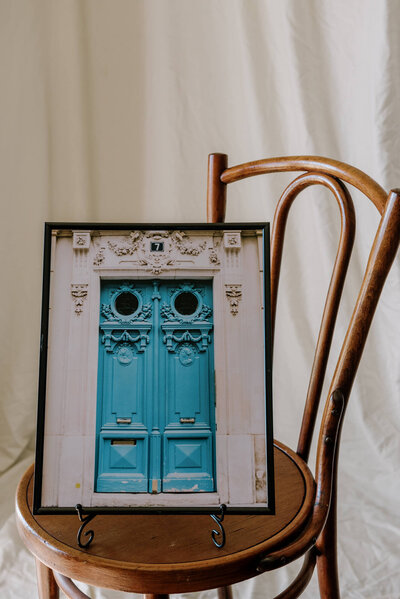 framed print of a blue door in paris' sixth arrondissement by the luxembourg gardens