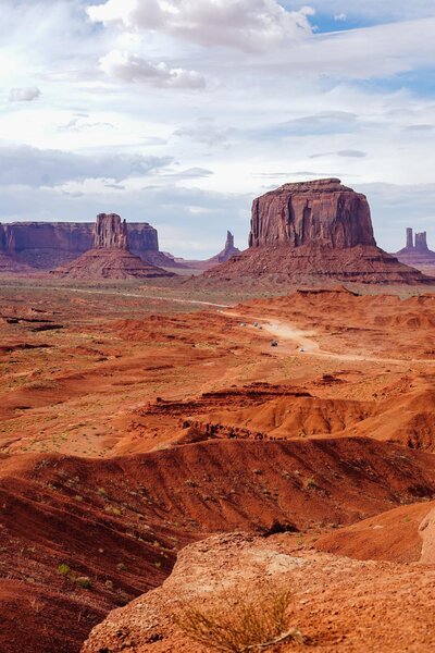 Large orange buttes amongst a Utah desert landscape