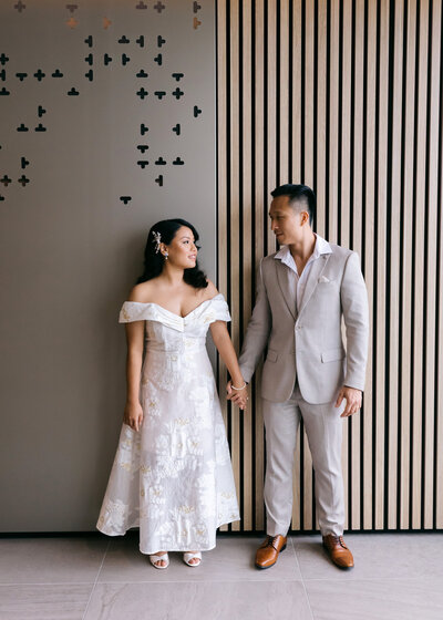 Couple embracing after their ceremony at the Brisbane Registry Office — candid and elegant registry marriage photography in Brisbane.