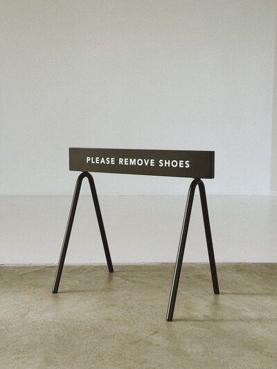 Remove shoes sign in Albuquerque event venu