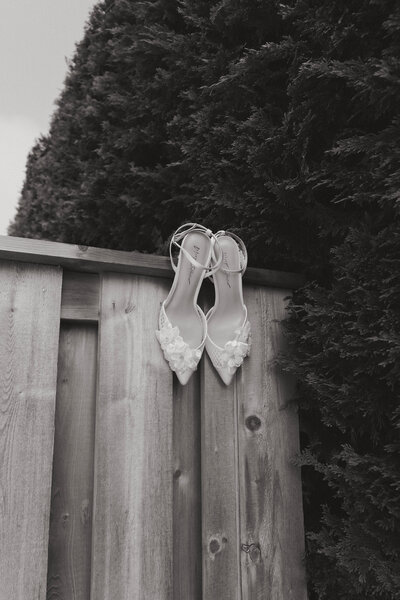 editorial detail shot of wedding shoes