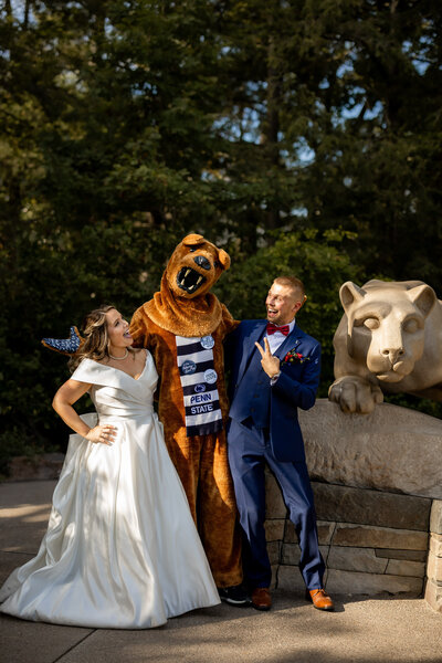 Bride and groom with the Penn State Nittany Lion mascot at the Nittany Lion Inn