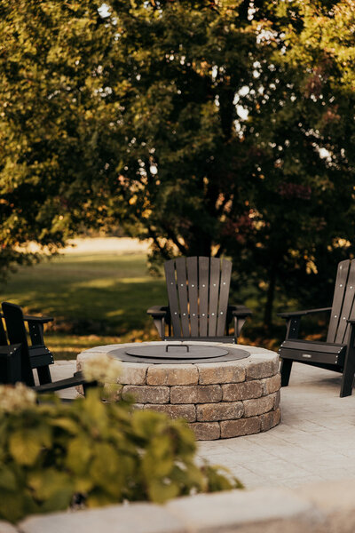 grounds at willowbrook with stone firepit and courtyard