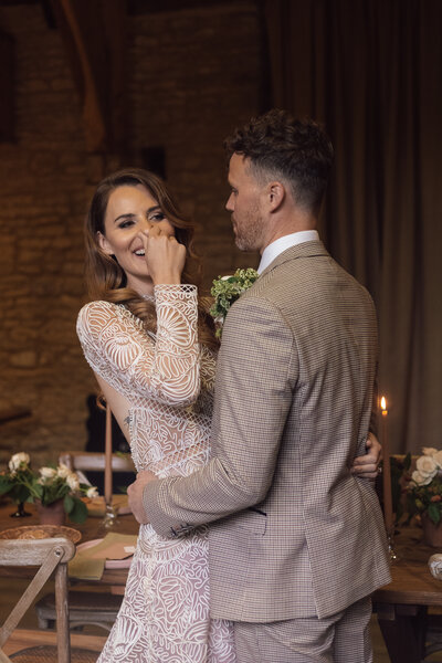 Wedding photographer captures couple taking a stroll hand in hand at their french chateau wedding.