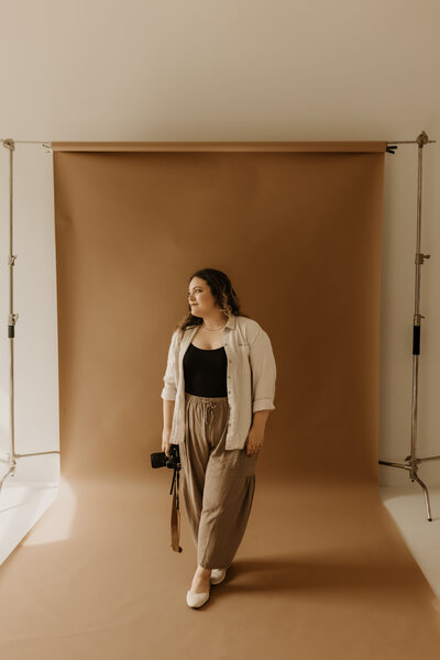 A portrait of Alanie Sayer, a Louisiana family and wedding photographer. 