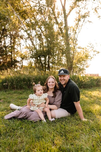 McKenna Fahrenbruch with her husband and daughter, the family team behind Graceful Exposure Media, a heart-led business offering social media marketing and videography services