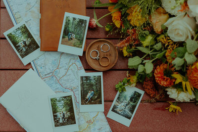 rings and polaroids with map and flowers
