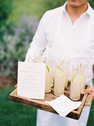 Handwritten cocktail sign on tray-passed drinks tray