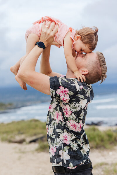 dad kissing girl