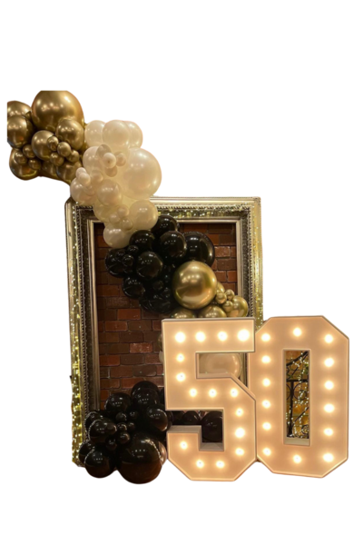 2 traditional marquees with an elegant garland draped behind for a fabulous 50 themed birthday party designed by Loononna, Orlando, FL