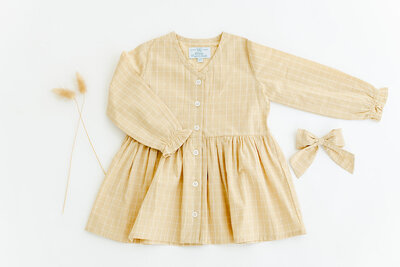 Light yellow plaid dress for a toddler