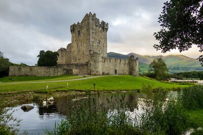 Castle in Killarney with green grass