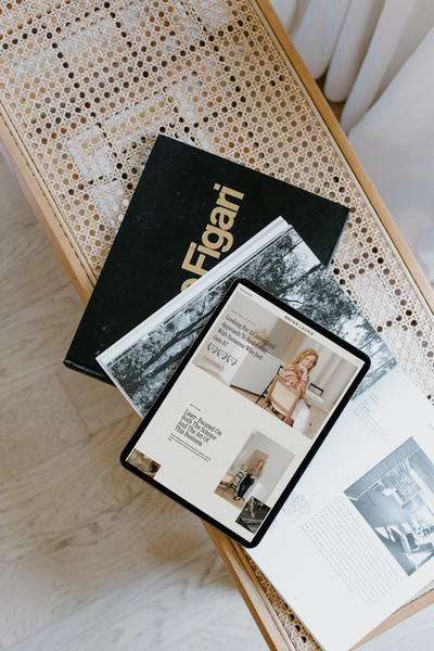 A styled tablet displaying a blog layout, emphasizing clean design and strategic SEO optimization for monthly blogging.