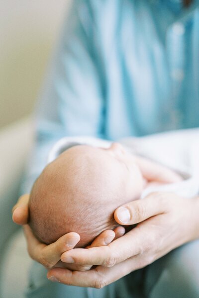 close up photo of newborn baby's wrinkly head