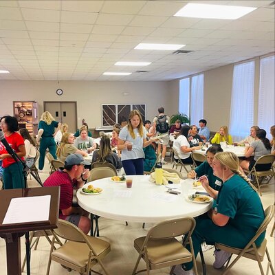 group of medical students sitting at table