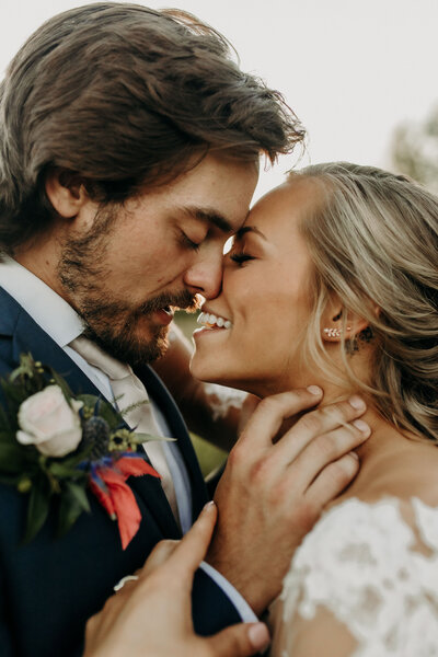 bride and groom embracing