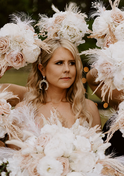 A Houston bride-to-be getting ready with professional hair and makeup services in a modern Houston studio.