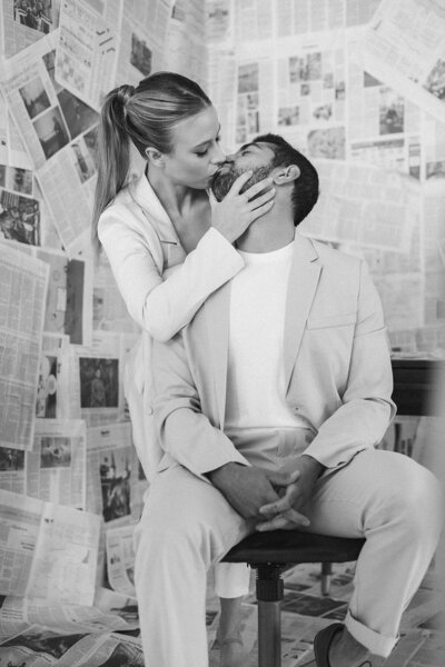 A couple kisses