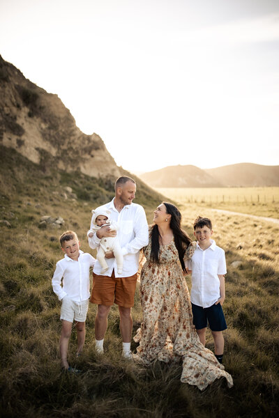 Family walking natural posed photographed in park location