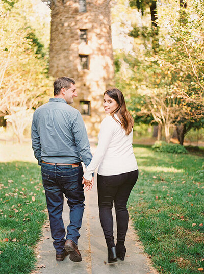 Bride and groom walk up memorial steps at their DC wedding