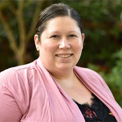 Rachel smiles for a portrait