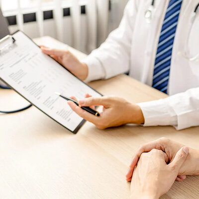 Doctor reviewing medical chart