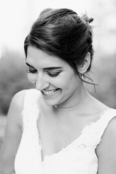 bride smiling in the street of paris