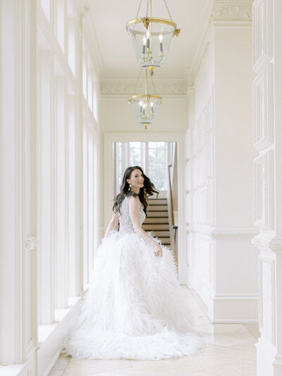 bride running down hall at olana in hickory creek texas