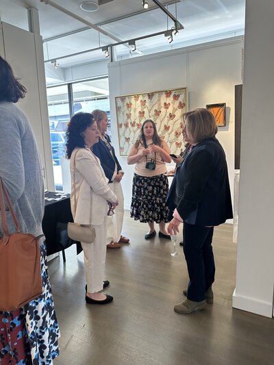 group of women at community event talking