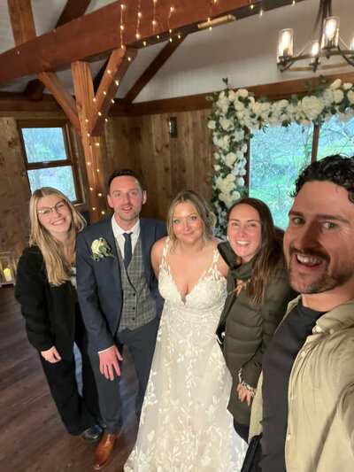 Amy & Nick posing with couple