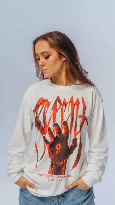 Someone taking out mcdonalds french fries from a package