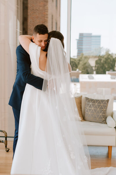 Grooms first look with bride and embrace