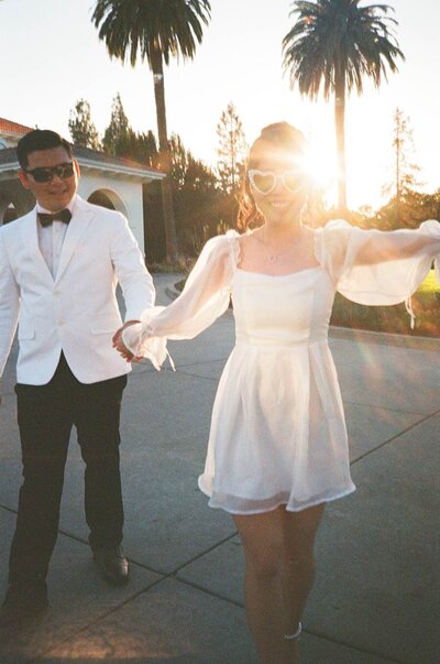 Southern California Wedding Photo with cowboy hat and boots on bride