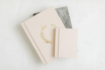 Three heirloom albums available for clients working with Katie Stansfield Photography, a family photographer in Richmond.