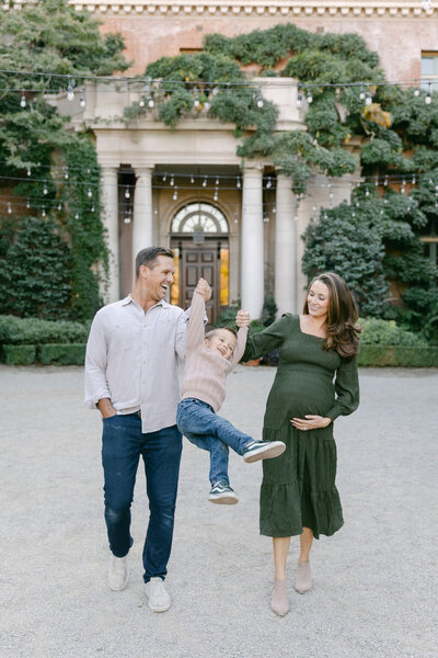 Couple in field in California for maternity photoshoot