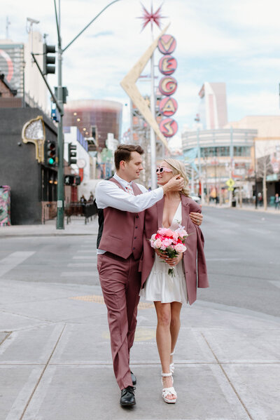 Pretty in pink elopement on Fremont street in downtown Las Vegas
