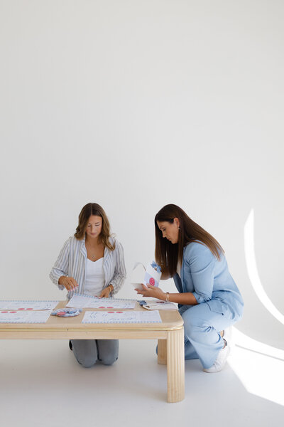 Melinda and Chancey, the team behind Fancy Chancey in San Diego CA, putting together event favors 