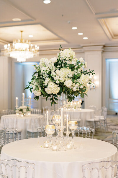 bouquet and candle centerpieces at wedding at the Ritz-Carlton