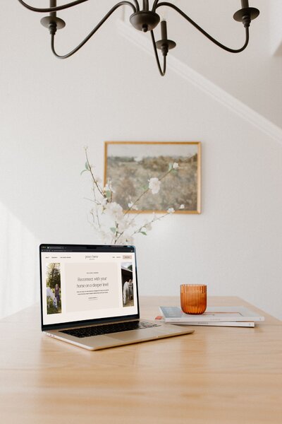 Minimal, neutral-toned website design for Peace Horse Collective displayed on a laptop, showing calm, nature-inspired branding.