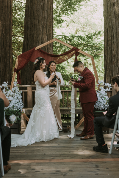 lesbian wedding ceremony at sanborn park with moody editing style